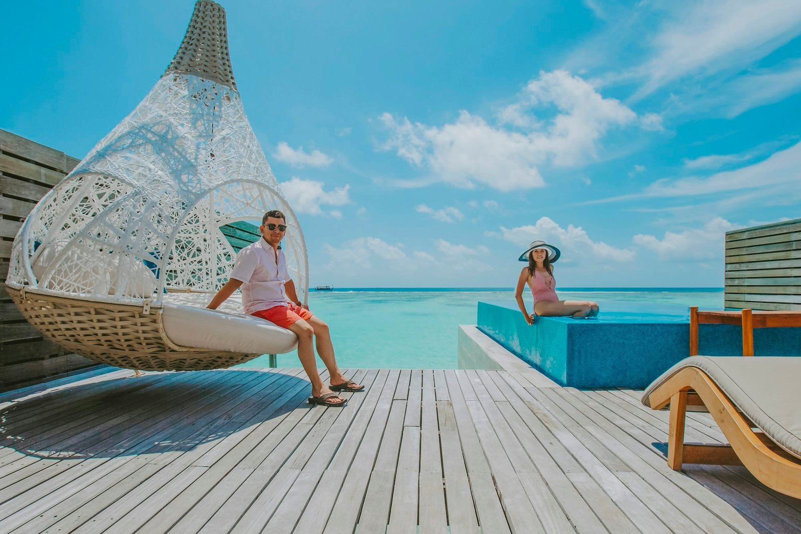 A couple at a luxurious resort in Maldives while on a summer vacation