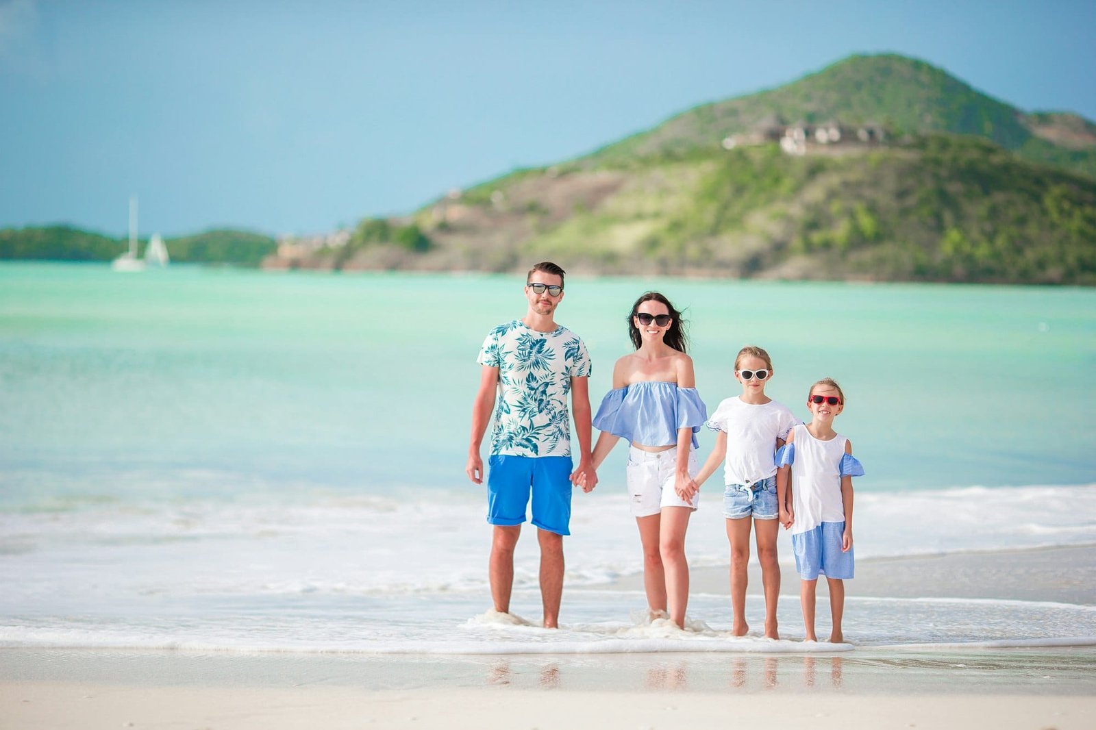 Happy beautiful family on the beach