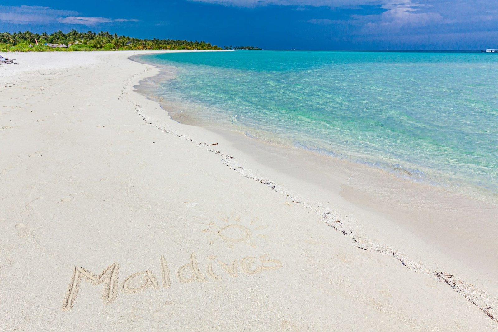 White sandy beach in Maldives with amazing blue lagoon